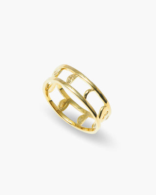 Protector ring in 14K gold plated, open band with moon cutouts, angled view