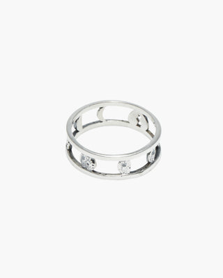 Protector ring in 925 sterling silver, open band with moon cutouts, front view