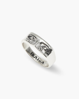 Her Tears ring in 925 sterling silver, signet with engraved eyes, angled view
