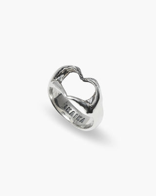 Love Language ring in 925 sterling silver, two hands forming a heart, angled view