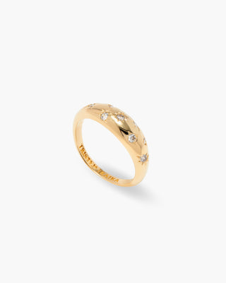 Flashing Lights ring in 14K gold plated, domed ring with star-set cubic zirconia, angled view