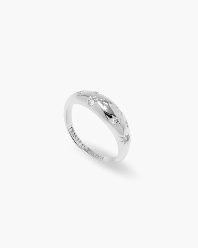 Flashing Lights ring in 925 sterling silver, domed ring with star-set cubic zirconia, angled view