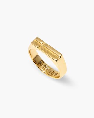 Cross the World ring in 14K gold plated, flat cross signet with Old English lettering inside, angled view