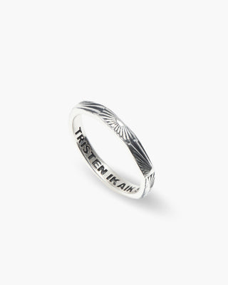 Sunny Boy ring in 925 sterling silver, thin band with hand-drawn sun rays, angled view