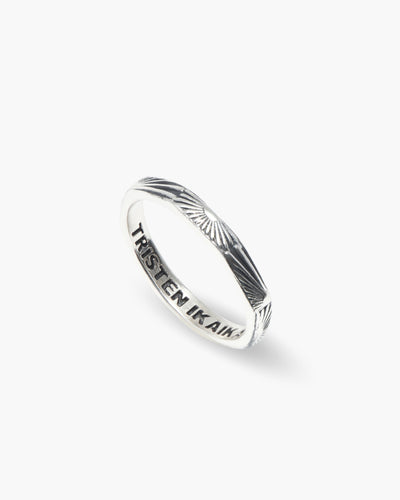 Sunny Boy ring in 925 sterling silver, thin band with hand-drawn sun rays, angled view