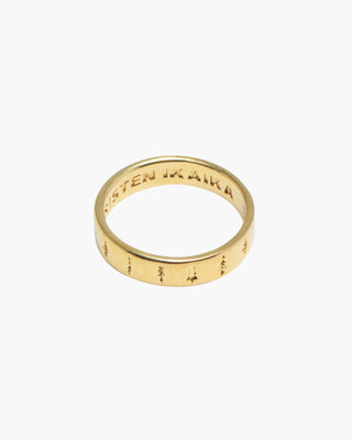 The Pines ring in 14K gold plated, band with pine trees around the outside, front view