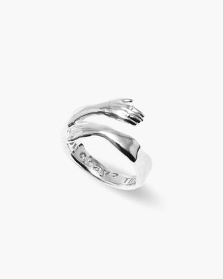 Hug Life ring in 925 sterling silver, two-arm hug wrap, angled view