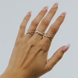 4 Ever Ever ring worn: hand wearing a stack of thin rings